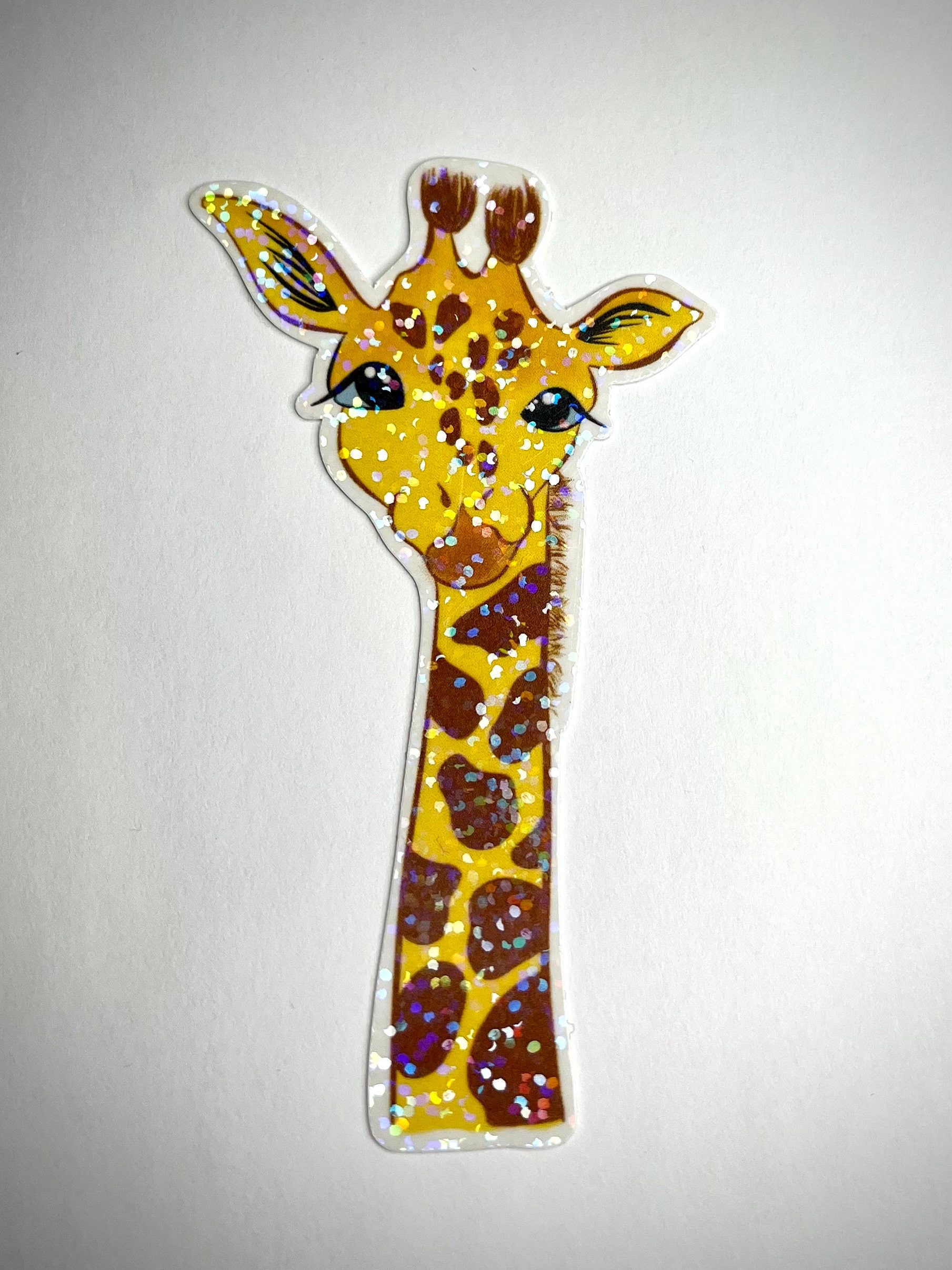 Cartoon giraffe vinyl sticker - waterproof decal for laptops, notebooks, tumblers, and more