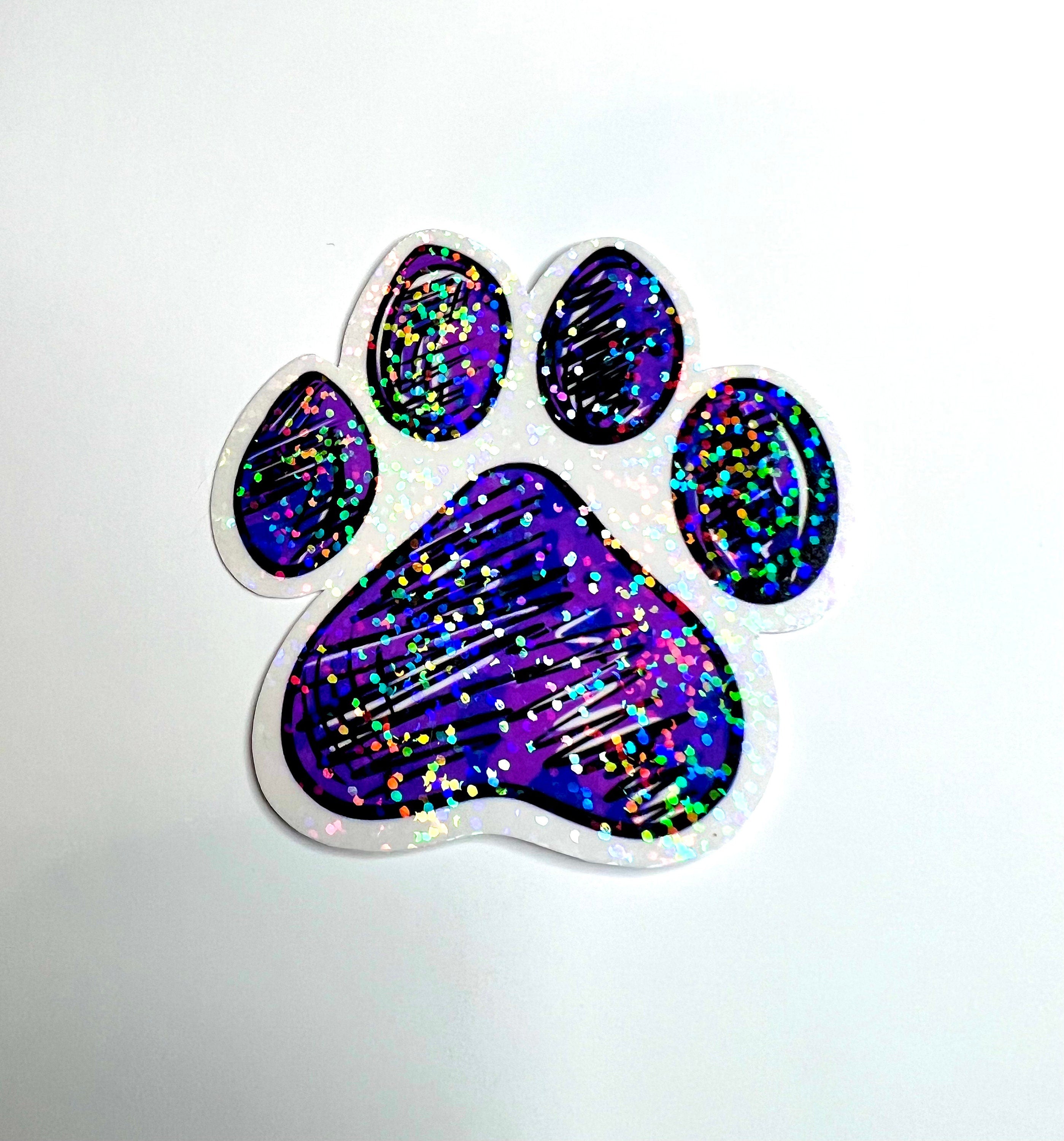 Paw print sticker in purple - waterproof vinyl decal for laptops, notebooks, tumblers, and more