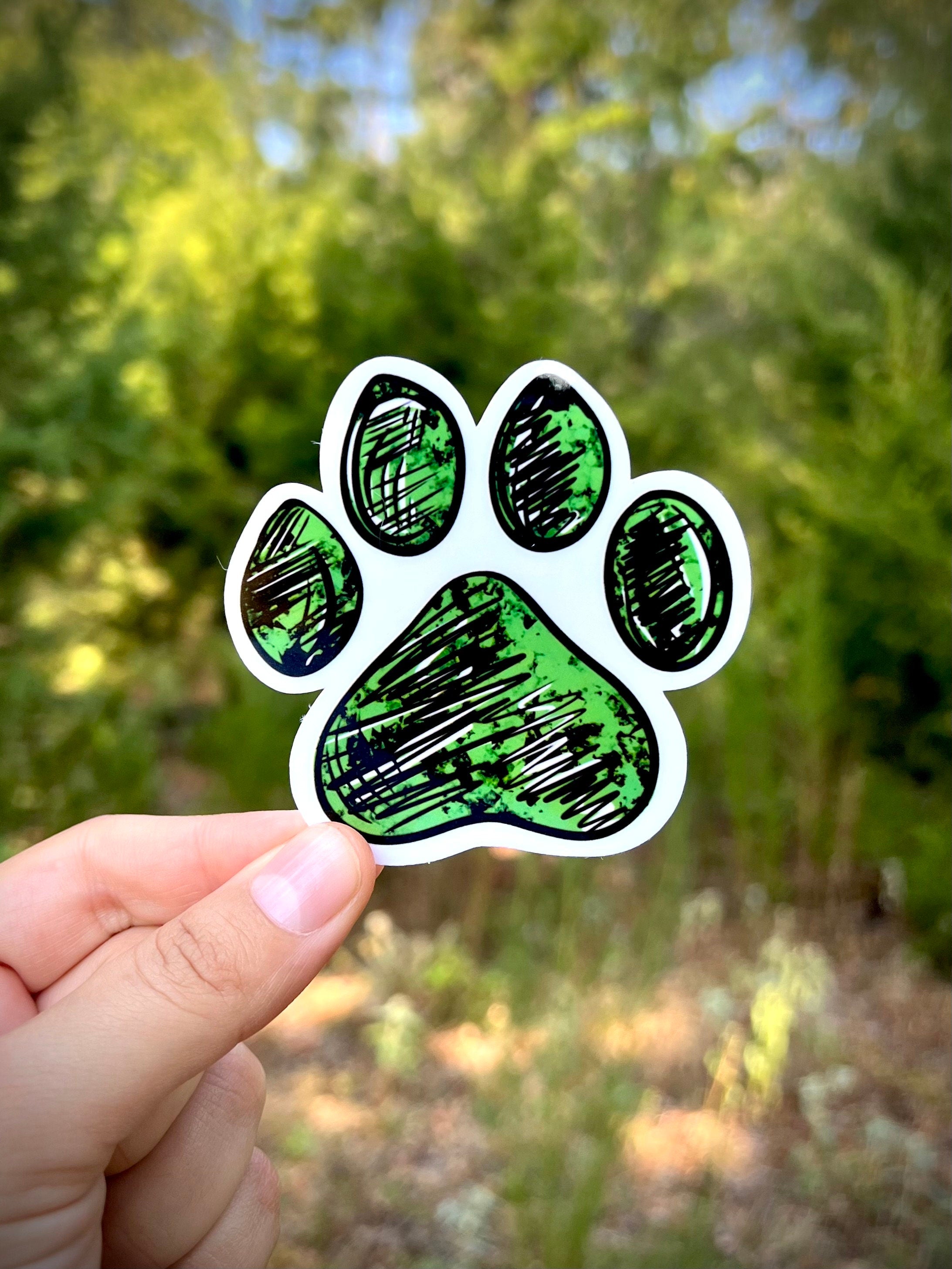 Paw print sticker in green - waterproof vinyl decal for laptops, notebooks, tumblers, and more